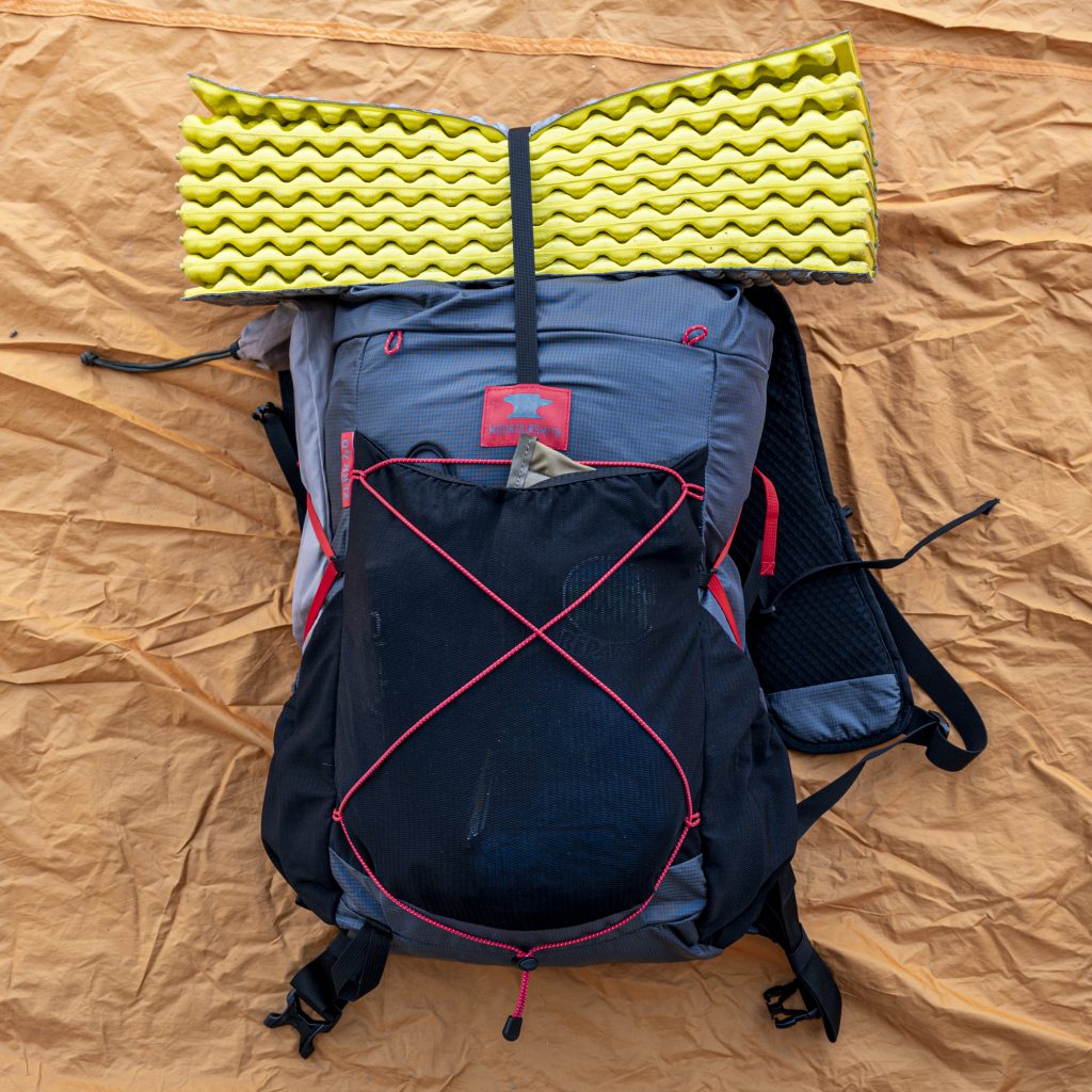 a fully packed backpack ready to hit the trail